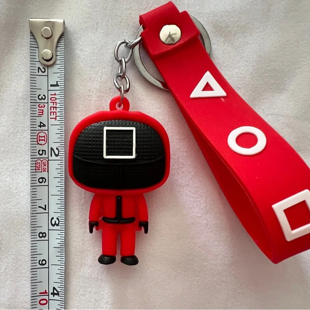 Squid Game Red Keychain with Character and Symbols